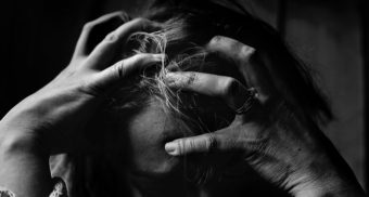 Workplace Stress Woman holding head, stress