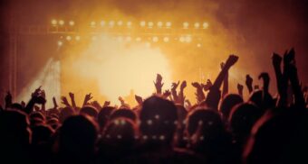 A photo of people enjoying a concert. (Photo: vishnurnair / Unsplash)